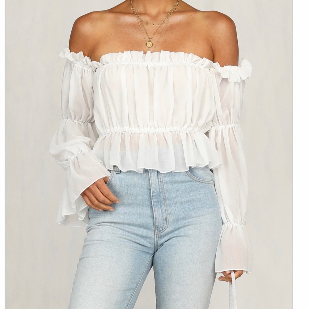 Sheer white crop top. Never been worn.